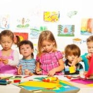 Children engaged in a colorful arts and crafts activity.